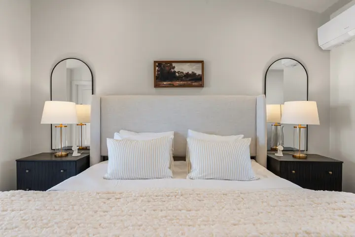 Fourth-floor king bedroom with recliner bed at The Rad Retreat
