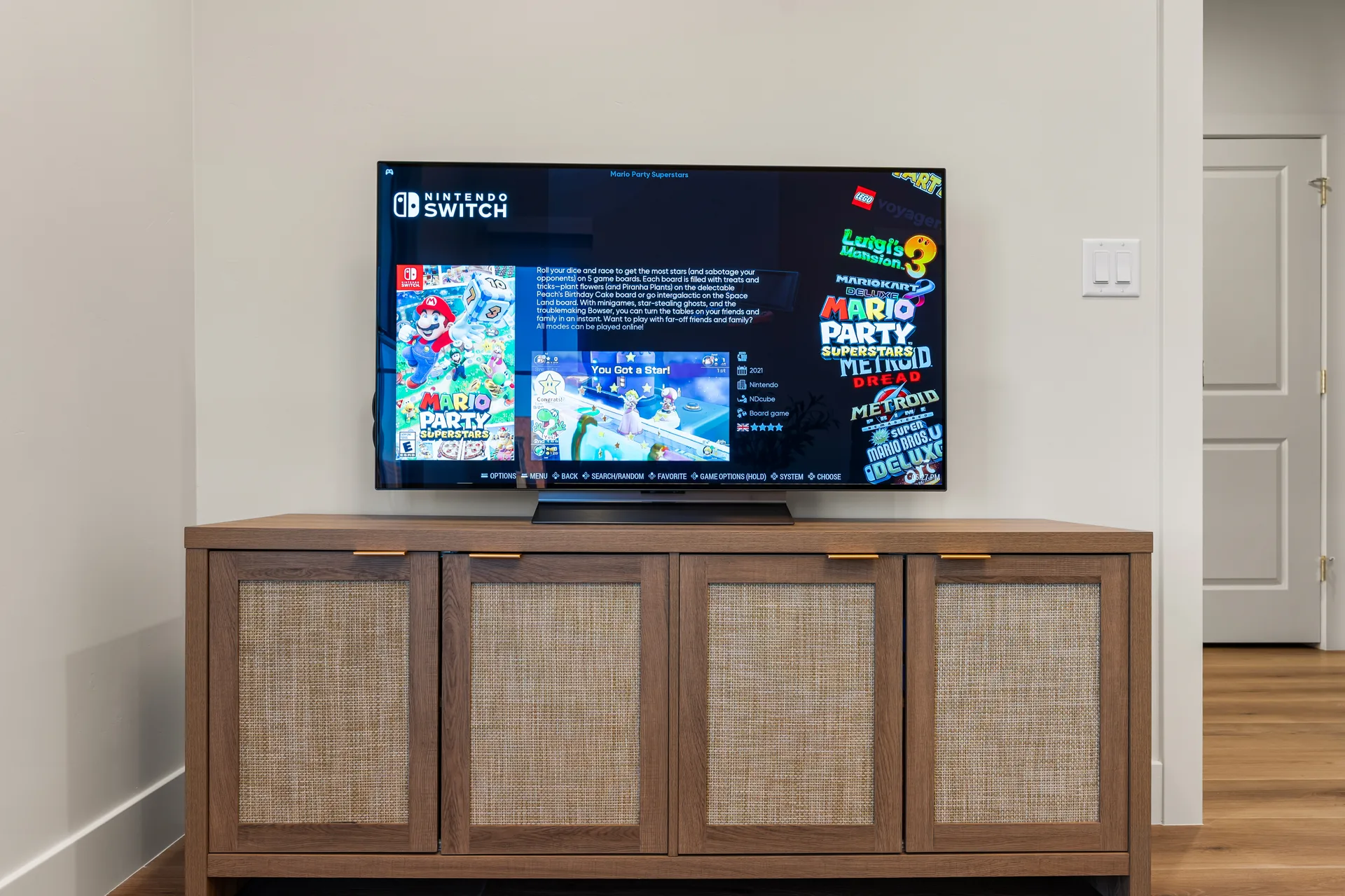 Game room TV and lounge area at The Rad Retreat